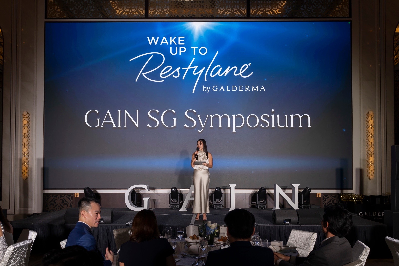 Fiona Loh hosting the GAIN SG Symposium