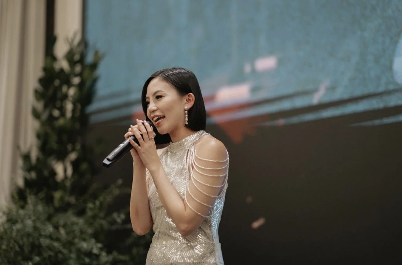 Fiona Loh on stage — bilingual emcee and presenter in Singapore